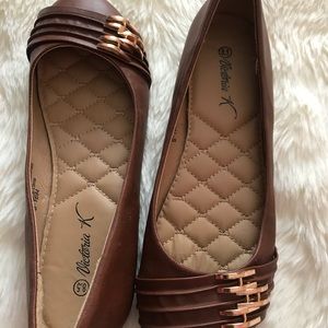 Brown Victoria flats